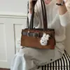 Bolso de Hombro Colgante Vintage Aspecto Gamuza Portátil para Viajes Diarios 2026 Bolso de Conejo de Moda Nuevo para Mujer Debajo del Brazo Otoño