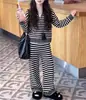 Conjunto de Suéter para Niña Otoño/Invierno 2026 Nuevo Estilo Coreano Chaqueta de Punto Pantalones Anchos Casuales Conjunto de Dos Piezas Estilo Perezoso