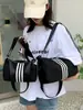 Nueva Bolsa de Estudiante de Nylon de Aspecto Elevado Estilo Coreano Moderna Bolso Tote Portátil Gran Capacidad Bolso de Hombro Cruzado Único Japonés para Mujeres