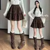 Falda Dulce de Pastel Estilo Ballet Suede Caída/Invierno 2026 Falda Línea A Falda Corta Plisada con Volantes Abullonados para Mujer