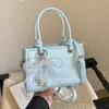 Bolsa de Ombro Casual Nova Moda Verão 2026 Transfronteiriça, Bolsa Transversal Estilosa e Atraente, Bolsa Quadrada Pequena Casual de Mão
