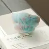 Caneca de Cerâmica com Borda de Flor de Orquídea Pintada à Mão com Esmalte Submerso Novo Estilo Chinês Caneca de Chá Doméstica Conjunto de Chá Gongfu Caneca Única para Uma Pessoa Preparar Chá