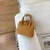 Bolsa versátil de moda transfronteiriça, grande capacidade, nova bolsa casual primavera 2026, bolsa quadrada pequena, de ombro e sob o braço