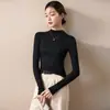 Top base de cuello alto a media altura de modal para mujer, adecuado tanto para llevar debajo como por encima, nueva colección primavera/otoño 2026, elegante top negro con un toque de alta gama
