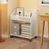 Estantería de pie, móvil, todo en uno, que se puede colocar junto a un escritorio, con almacenamiento para libros y un pequeño carrito para bocadillos y juguetes, adecuada para uso doméstico y niños.