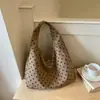 Bolso de mujer de gran capacidad 2026 nuevo de moda otoño casual moda lunares bolso de hombro ligero para commuters bolso de axila