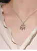 Collar con Candado de Seguridad de Acero de Titanio que No se Desvanece con Jade Hetian para Mujer 2024 Nuevo Popular Lujo Ligero Nicho Gama Alta Clavícula