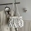 Bolso de mano fresco y delicado de lunares con un lazo, nuevo diseño de moda nicho para mujer 2026, bolso de hombro para ir al trabajo, bolso de axila