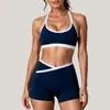 Conjunto de fitness de bloques de color europeo y americano de Amazon transfronterizo, conjunto de yoga, pantalones cortos deportivos para correr, top sin mangas de cuello halter, conjunto de dos piezas para mujer