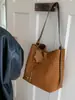 Cesta de Verduras de Gran Capacidad Bolso Cubo Súper Popular para Mujer 2025 Nuevo Bolso de Hombro Tote de Gama Alta para el Trabajo y los Viajes