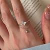 Selección de Arte Anillo Ajustable de Cadena Redonda de Zircón para Mujer Diseño Nicho de Lujo Ligero Diamante Borla Anillo Mariposa