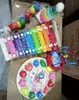 Relógio infantil piano de oito tons quatro conjuntos de empilhamento de colunas torre arco-íris prato em forma de inseto torcido brinquedos educativos para bebês atacado