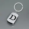 Chaveiro de Aço Inoxidável com 26 Letras Inglesas Vazadas e Polidas Transfronteiriço Simples Personalizado Pingente para Mochila Carro