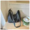 Bolsa de Gran Capacidad Transfronteriza Nuevo Otoño 2026 Bolso Retro de Hombro Individual Moda de Mano Cruzado Versátil Bolso para Debajo del Brazo