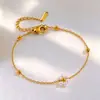 Venta al por mayor transfronteriza de joyería de moda Chanel Flor Perla Titanio Acero Collar Pulsera Traje Diseño de Nicho Sentido Avanzado