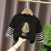 Top de estilo patchwork de dos piezas falsas, moderno y a la moda, para niñas, camiseta de manga larga a rayas de algodón puro con dibujos animados