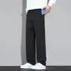 Pantalones casuales al por mayor con bolsillos y cremalleras, estilo fino de primavera y otoño, nuevo modelo 2026, pantalones rectos holgados para hombres de mediana edad