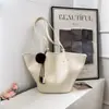 Bolsa tote grande de outono/inverno transfronteiriça nova para mulheres, bolsa de ombro simples e fashion 2026, adequada para trabalho e deslocamento, e pode ser carregada sob o braço