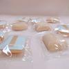 Base de maquillaje líquida especial para maquillaje húmedo y seco, directa de fábrica, con forma de huevo, triangular, con cojín de aire, polvos sueltos y azúcar de diamante.