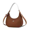 2026 Nova Tendência Design de Nicho Simples Design de Nicho Francês Bolsa de Ombro Único para Axila Bolsa Feminina de Ombro Único Formato de Croissant Bolinho