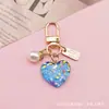 Pingente de Chaveiro Novo Amor Transfronteiriço Acrílico Pérola Pequeno Fresco Capa de Fone de Ouvido Bolsa Pingente Presente Fofo