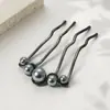 Horquilla de alta gama con forma de U y perla para mujer, horquilla moderna con cabeza esférica, accesorio para el cabello