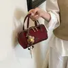 Bolso de mano tipo almohada con bloques de color de moda retro transfronterizo para mujer, nuevo bolso Boston de mano de alto valor, bolso de hombro y cruzado