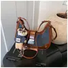 Bolsas de Nicho de Alta Qualidade Transfronteiriças para Mulheres Outono e Inverno 2025 Nova Moda Bolsa Transversal de Ombro Único Estilo Coreano Popular Bolsa Dumpling