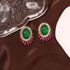 Pendientes de botón para oreja aretes aretes diseño geométrico verde europeo y americano retro avanzado exquisito lujo ligero temperamento nicho moda