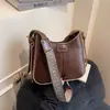 Bolsas Pequenas Mais Vendidas Outono e Inverno Nova Moda 2025 Bolsa Transversal Feminina com Alça Larga Bolsa de Ombro com Textura de Alta Qualidade