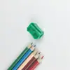 Afilador de lápices simple venta al por mayor en stock plástico octagonal un agujero color se puede especificar manual papelería para estudiantes