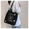 Bolsa de Ombro de Veludo Cotelê Tendência para Mulheres 2026 Grande Capacidade Bolsa de Mão Casual Estilo Coreano Bolsa de Mão Desenho Animado Estudante