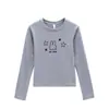Top redondo de manga larga color albaricoque para mujer, popular en primavera y otoño, con estampado de conejito de dibujos animados, corte ajustado, versátil, camiseta de moda