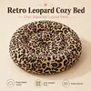Cama para Gatos Redonda de Peluche Suave y Esponjosa con Forma de Donut Gris Calmante Lavable