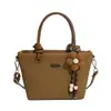 Bolso de diseño de nicho de alta gama para mujer, nuevo bolso de mano versátil de moda 2026, bolso tote, bolso de hombro, bolso cubo cruzado