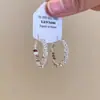 Pendientes geométricos de círculo plateados estilo coreano para mujer, pendientes minimalistas de nicho de alta gama, pendientes de aro lisos elegantes