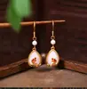 Nuevos Pendientes de Estilo Chino Color Antiguo Conservante Oro Chapado Alta Calidad Nicho Excedente Anual Gota de Agua Imitación Jade Estilo Antiguo