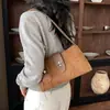 Bolso pequeño de alta gama para mujer 2026 nuevo bolso de moda elegante para mujer estilo coreano texturizado versátil para el trabajo y los desplazamientos bolso de un solo hombro