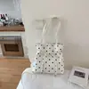Bolsa de mão versátil estilo coreano com poás, estilo simples para o dia a dia, bolsa tipo saco para mulheres, alto apelo estético, bolsa de ombro e transversal feminina