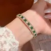 Pulsera Ovalada de Zirconia Chapada en Oro Real de 18k Moda Simple Versátil Anillo de Mano Lujo Ligero Nicho Sensación de Alta Gama Joyería de Mano