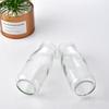 Lugar de fábrica mini botella de leche de vidrio 100ml pudín de seda con logo personalizable grande favorablemente