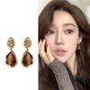 Pendientes de piedra ojo de tigre estilo vintage Maillard para mujer 2024 nueva explosión pendientes de alta gama adecuados para pendientes de otoño