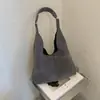 Bolsa de ombro minimalista transfronteiriça, grande capacidade, design novo e moderno 2026, estilo nicho, bolsa tote de axila, bolsa de mão feminina