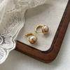 Elegantes pendientes de alta gama con hebilla de perla semicircular, ligeros y de lujo, combinables con todo, nuevos pendientes de explosión de 2024, pendientes de moda.