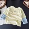 Camiseta de Manga Larga para Niños 2026 Otoño Nuevo Estilo Unisex Niños Casual Estilo Coreano Falso Dos Piezas Superior Niño Camiseta Base Grande