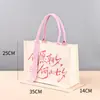 Bolsas de lona personalizadas transfronterizas con un toque de alta gama, bolsas de regalo navideñas, bolsas de lona promocionales para empresas