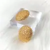 Pendientes de Metal con Forma de Huevo y Estambres de Flor Tridimensionales Europeos y Americanos Transfronterizos Nuevo Diseño de Alta Gama Moda de Nicho Pendientes para Mujer Pendientes