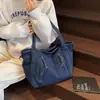 Bolso Portátil de Gran Capacidad a la Moda Estilo Coreano para Viajes Diarios Mujer Nuevo 2025 Bolso de Hombro de Mezclilla Bolso Tote de Color Sólido