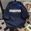Camiseta Feminina de Manga Curta com Estampa de Letras da Marca Americana Ins Tendência Verão 2025 Casual Solta Moda Versátil Gola Redonda