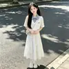 2026 Novo Conjunto de Saia Meia-Calça Branca com Laço para Meninas Conjunto de Duas Peças com Camisa Polo Nova de Verão para Meninas